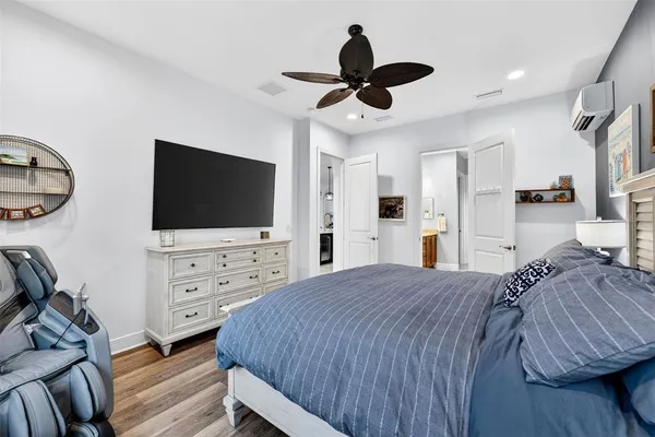 an aerial view of residential houses with outdoor space and swimming pool
