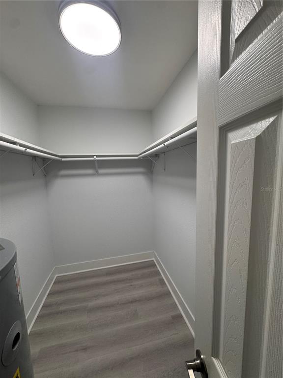 1 Windrush Boulevard, Unit 103 Indian Rocks Beach, FL 33785 - Photo 11 of 16 a view of a room with racks on the wall