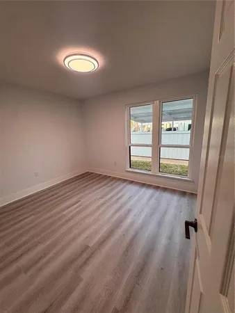 an empty room with windows