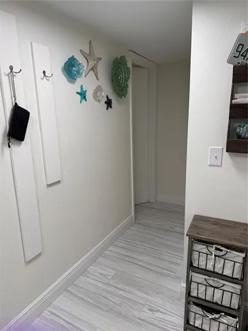 a view of a livingroom with wooden floor