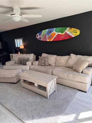 a living room with furniture and a couch