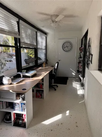 a room with furniture and a flat screen tv