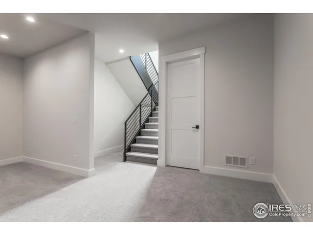 a view of an entryway with stairs