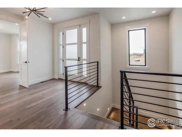 a view of entryway with wooden floor