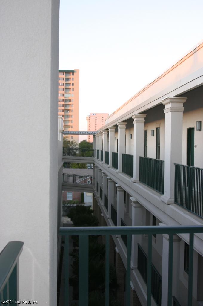 1661 Riverside Avenue, Unit 410 Jacksonville, FL 32204 - Photo 11 of 19 a view of a balcony with an outdoor space