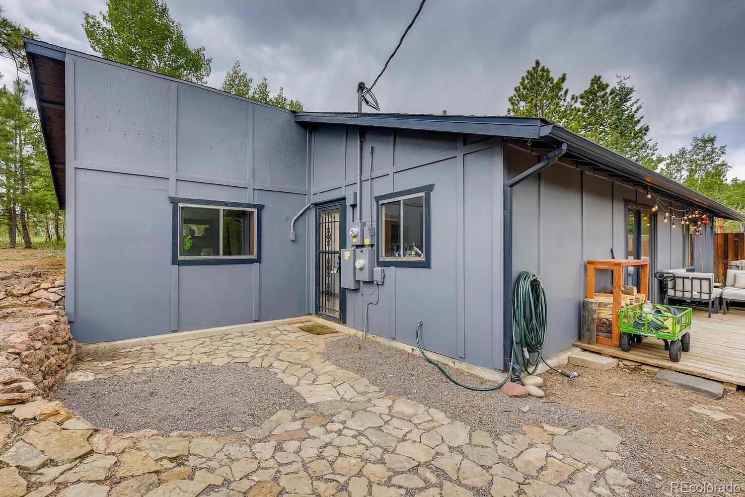 24 West Crosscut Road Bailey, CO 80421 - Photo 4 of 28 a house with a outdoor space