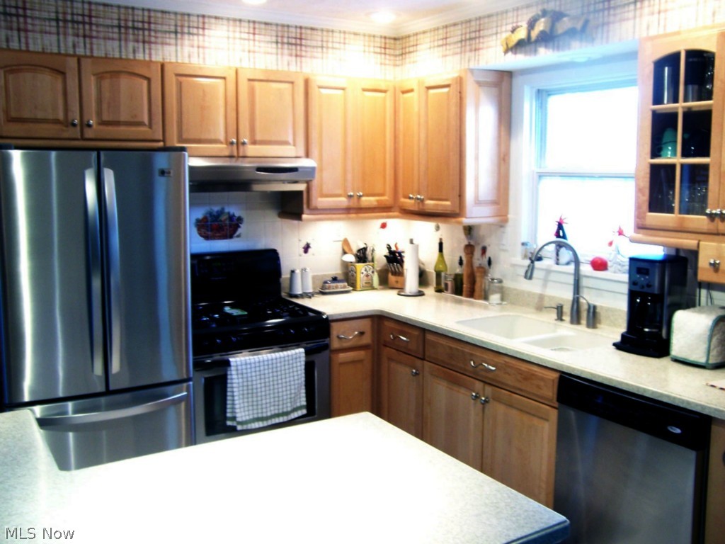 1259 Bennett Road Madison, OH 44057 - Photo 13 of 23 Updated Kitchen with Stainless Steel Appliances and corian countertops