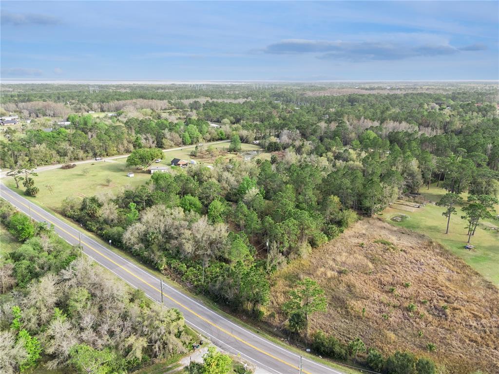 541 East Osceola Road Geneva, FL 32732 - Photo 2 of 31 a view of a field with an ocean