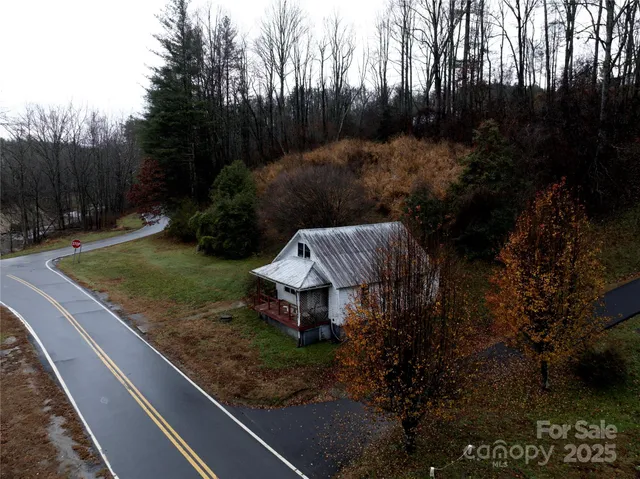 a view of a house with a street