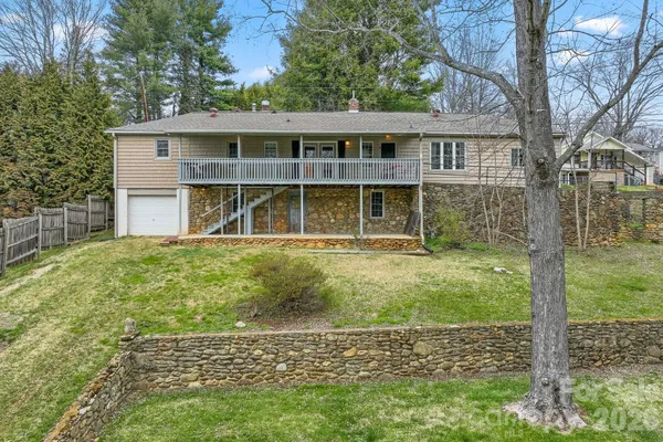 a house view with a garden space
