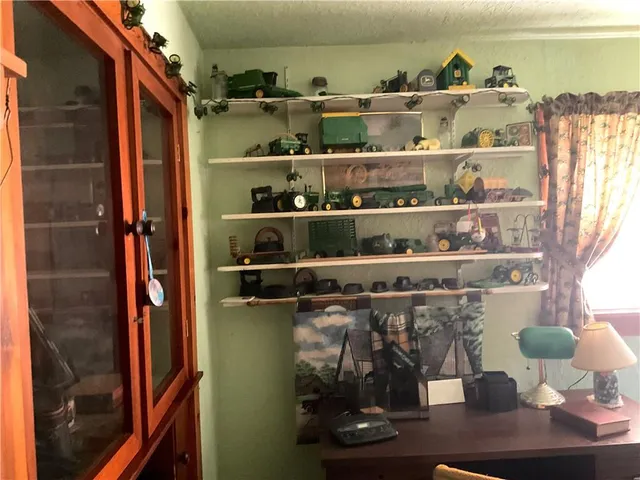 a living room with a couch and a table