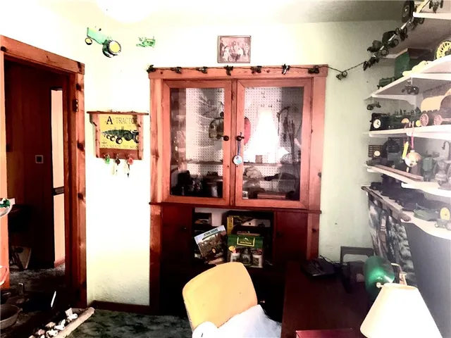 a bathroom with a sink mirror and toilet