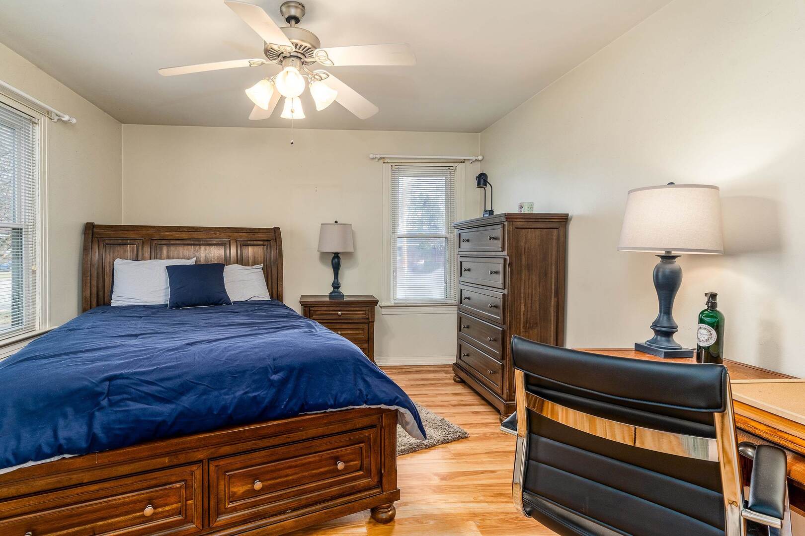 103 North 22nd Street Murphysboro, IL 62966 - Photo 12 of 23 a bedroom with bed and a chandelier