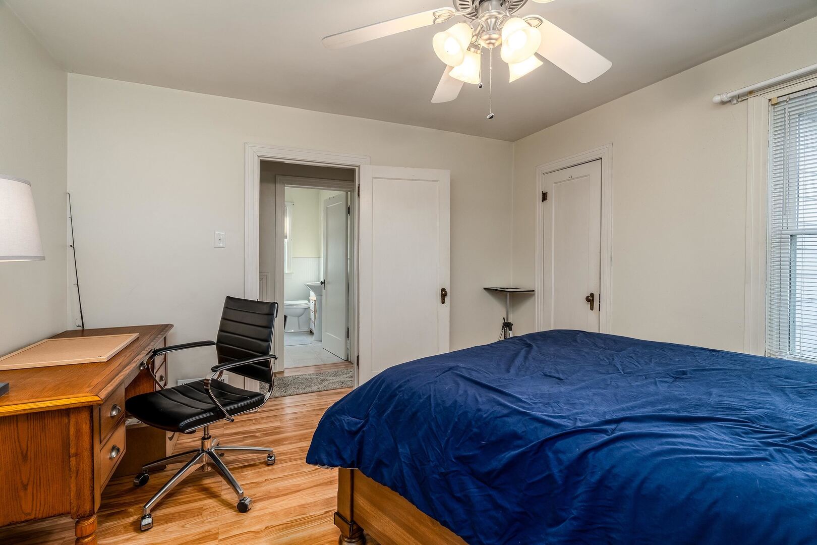 103 North 22nd Street Murphysboro, IL 62966 - Photo 13 of 23 a bedroom with a bed and a workspace