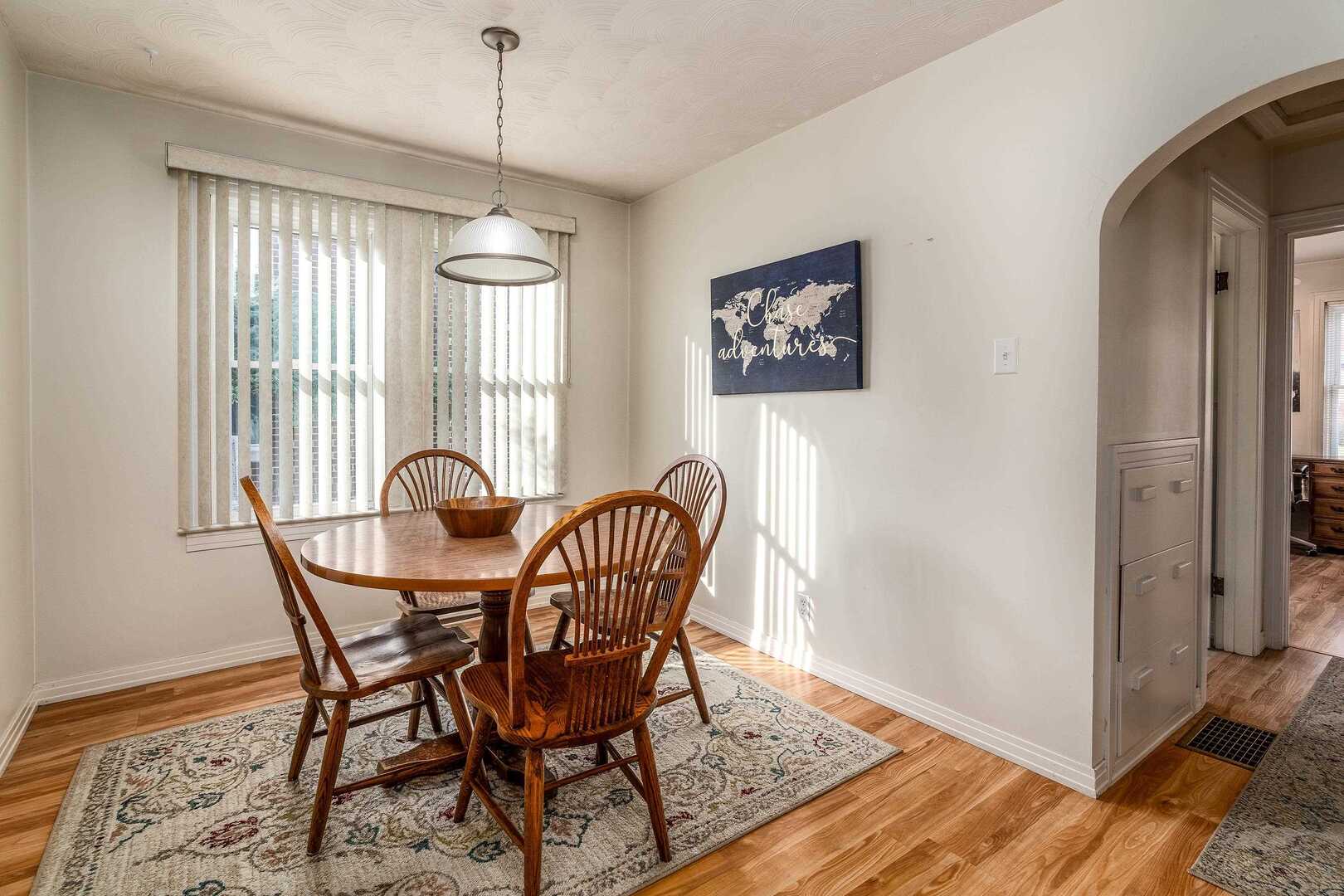 103 North 22nd Street Murphysboro, IL 62966 - Photo 8 of 23 a dining room with furniture window and wooden floor