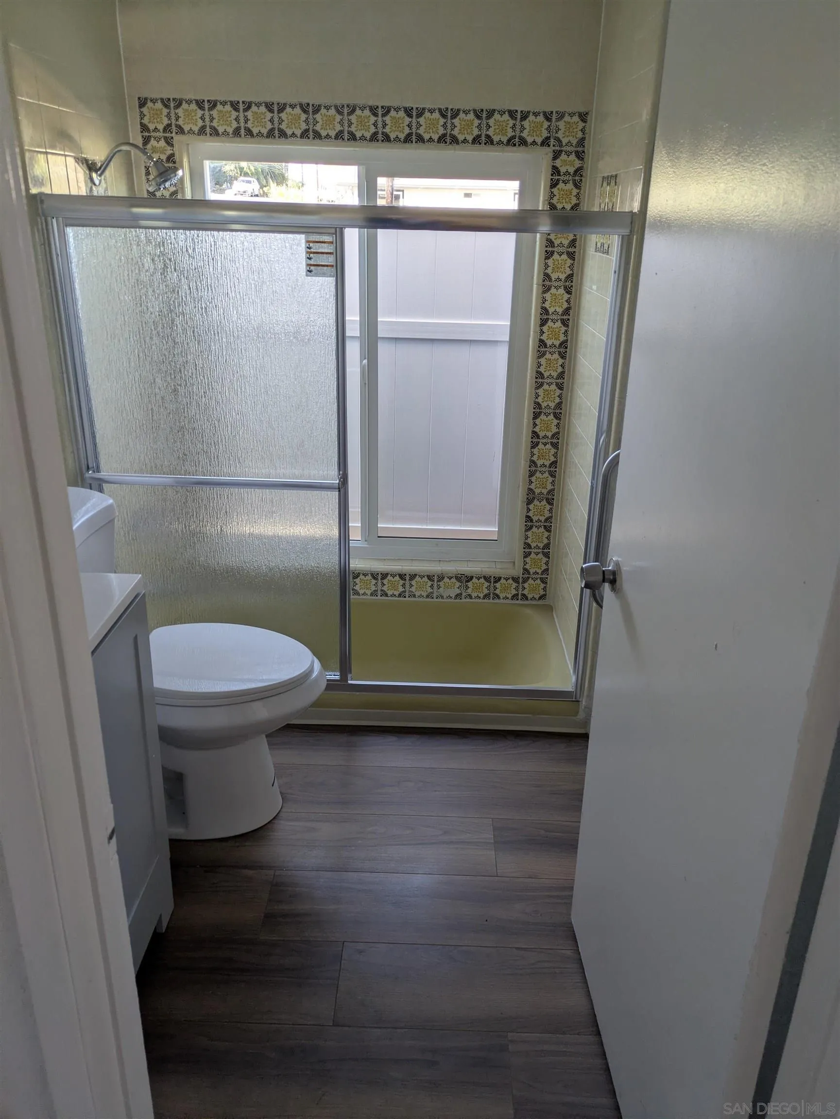 226 South Grape Street Escondido, CA 92025 - Photo 4 of 5 a bathroom with a toilet and a shower