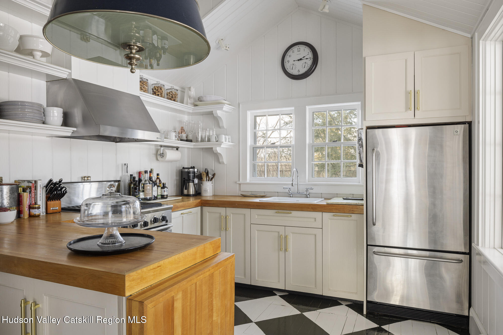 2887 Highway 209 Marbletown, NY 12401 - Photo 12 of 33 a kitchen with stainless steel appliances granite countertop a sink a stove and a refrigerator