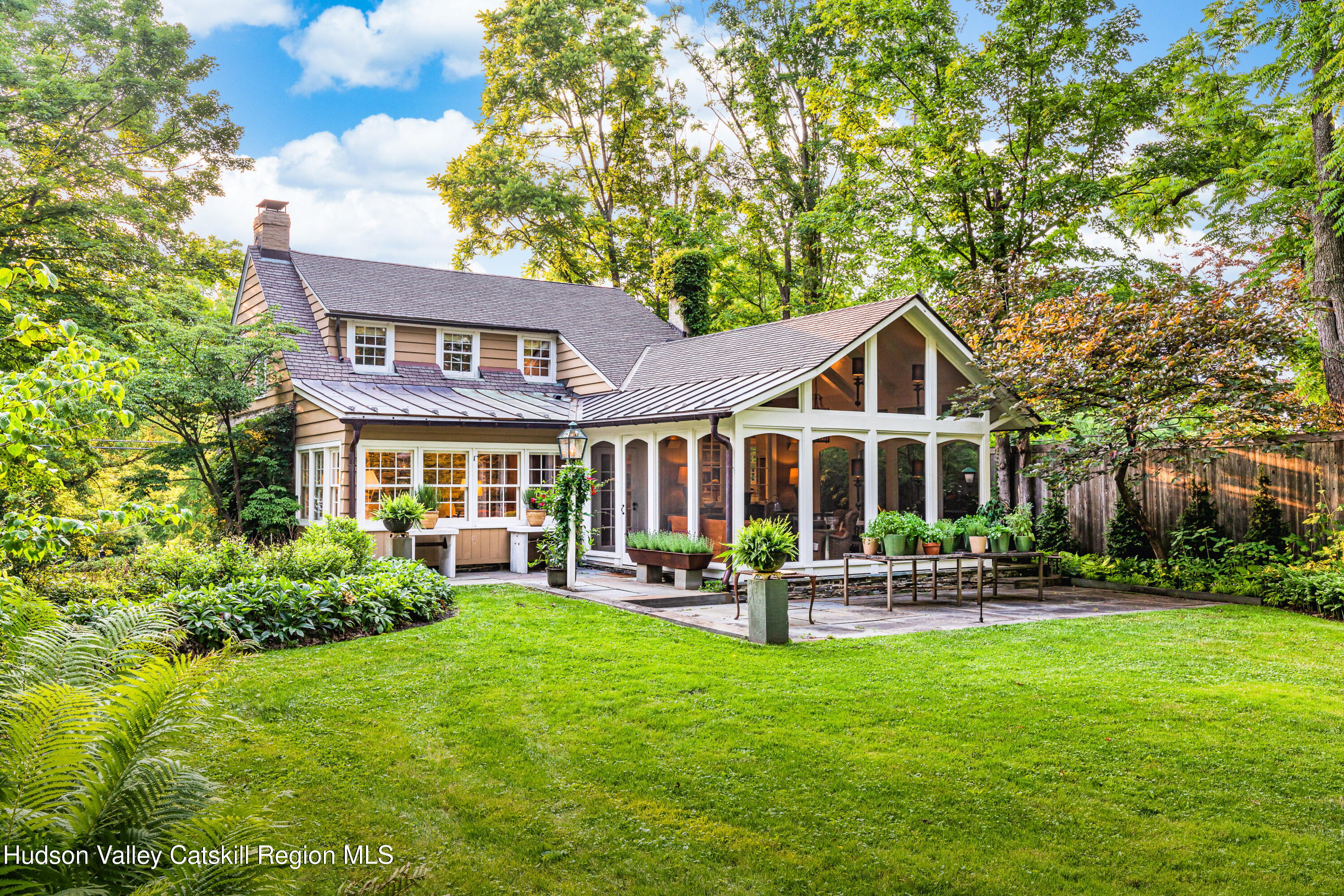 2887 Highway 209 Marbletown, NY 12401 - Photo 2 of 33 a front view of a house with a yard table and chairs