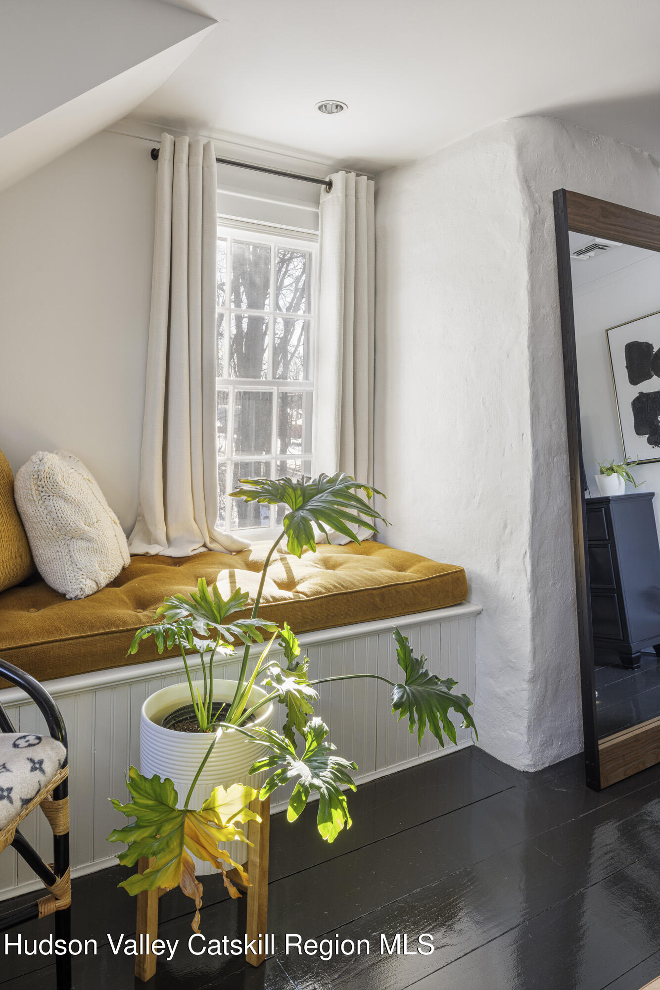 2887 Highway 209 Marbletown, NY 12401 - Photo 21 of 33 a bed sitting in a bedroom next to a window