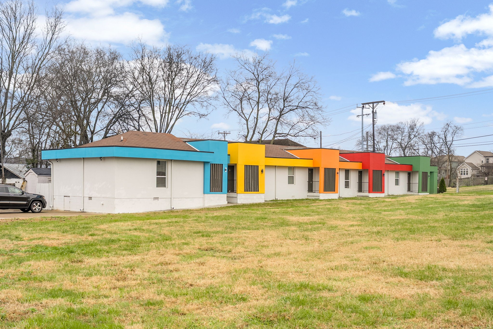 605 40th Avenue North, Unit E Nashville, TN 37209 - Photo 17 of 21 a front view of house with yard and trees