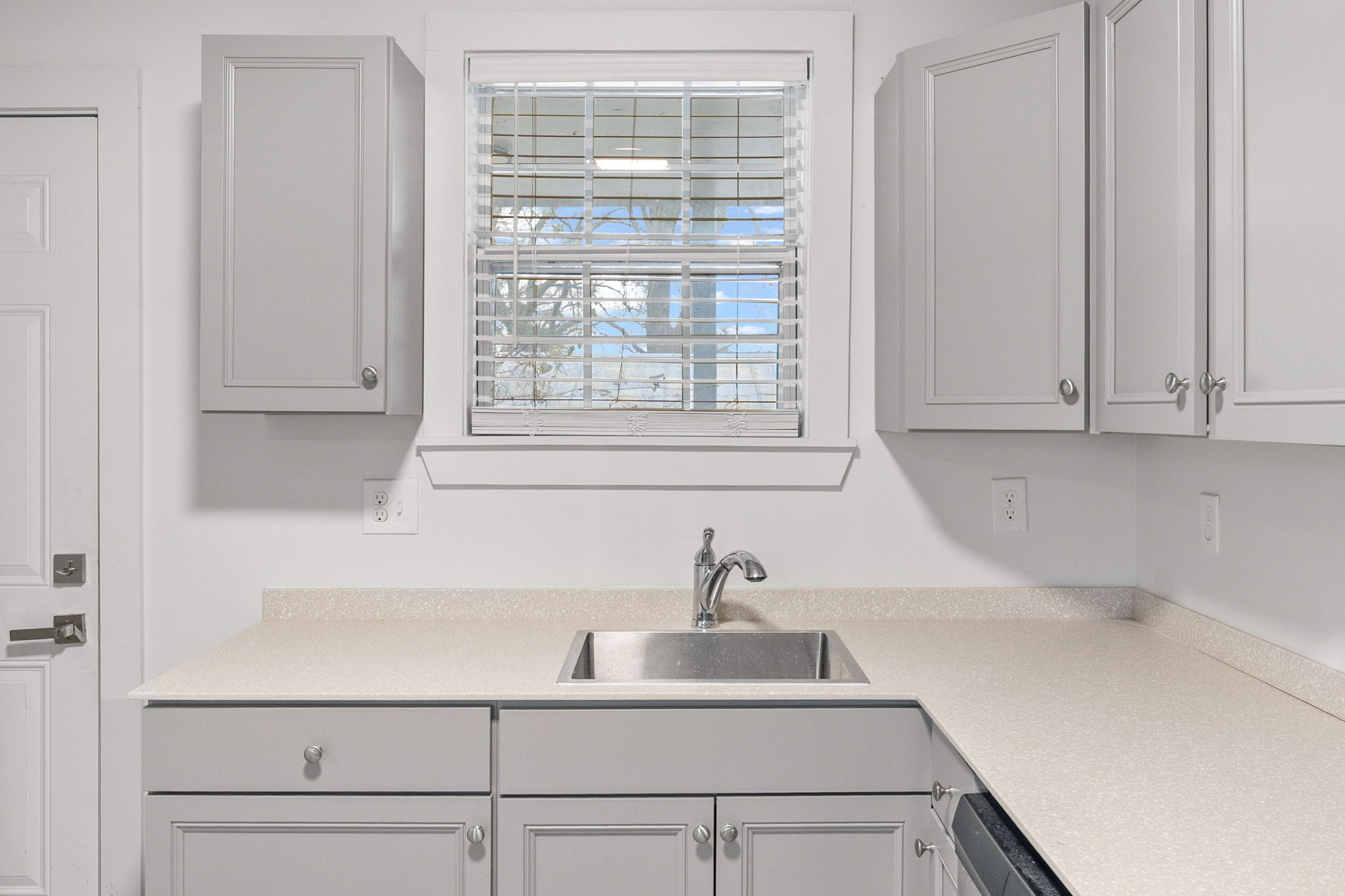 605 40th Avenue North, Unit E Nashville, TN 37209 - Photo 2 of 21 a bathroom with a sink and a window