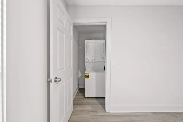 a kitchen with a sink stove and refrigerator