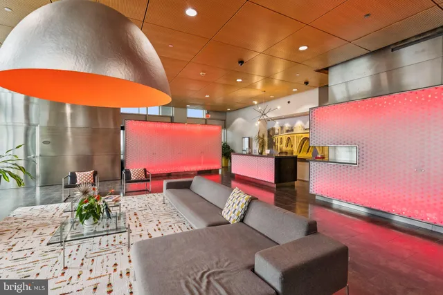 a outdoor space with lots of furniture and outdoor seating