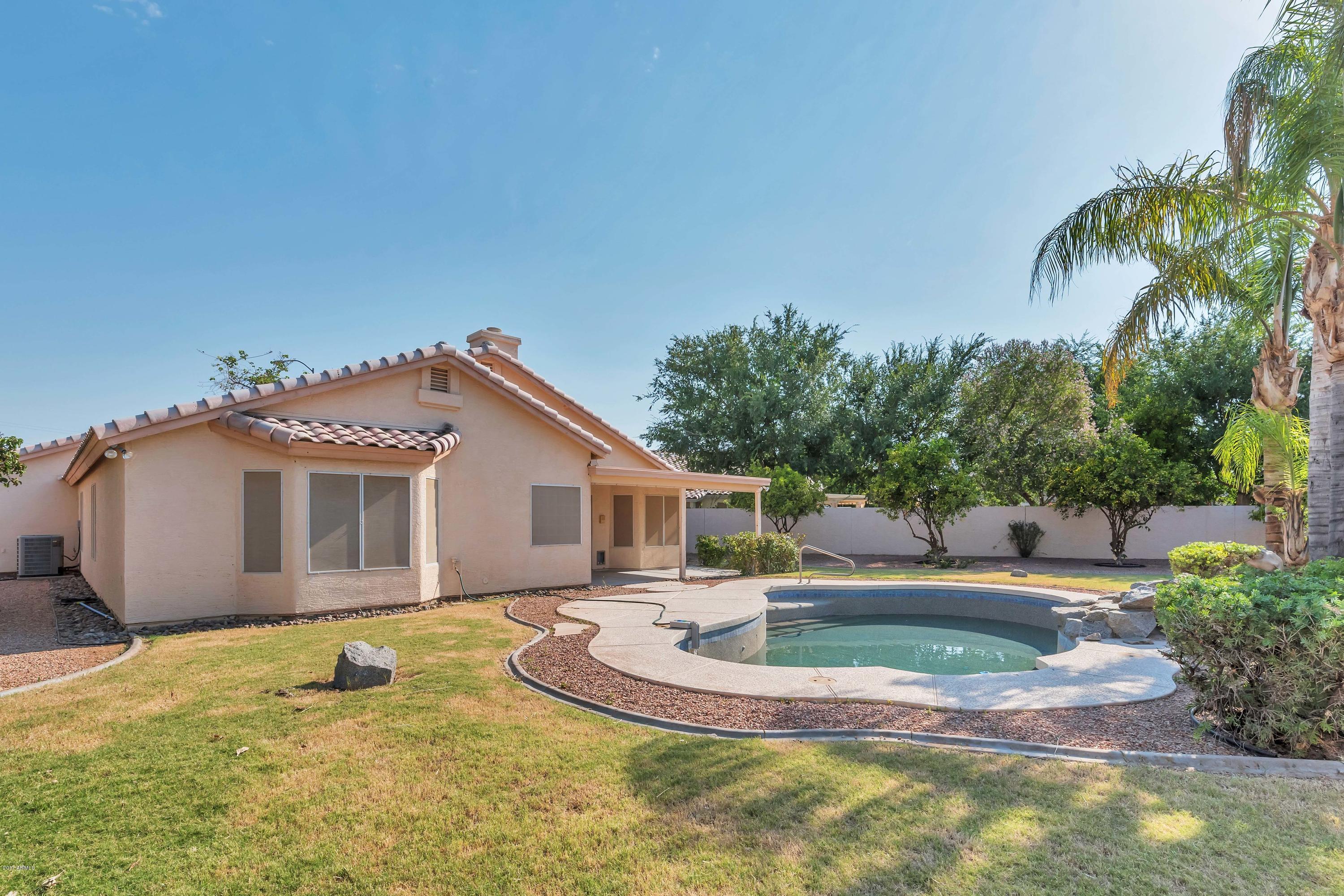 7759 East Decatur Circle Mesa, AZ 85207 - Photo 29 of 30 Grassy Backyard
