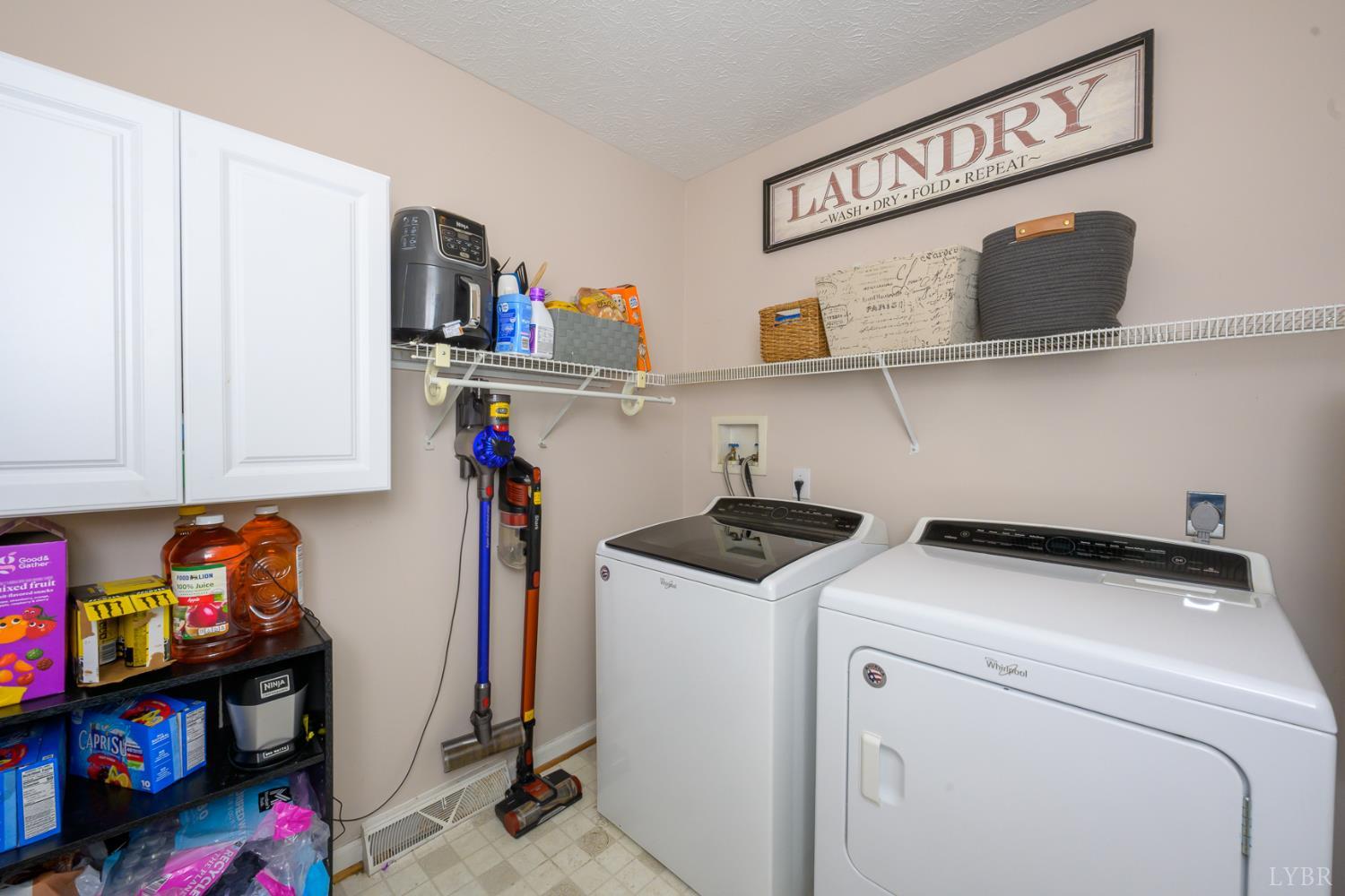 151 Wilderness Road Rustburg, VA 24588 - Photo 12 of 63 a utility room with dryer and washer