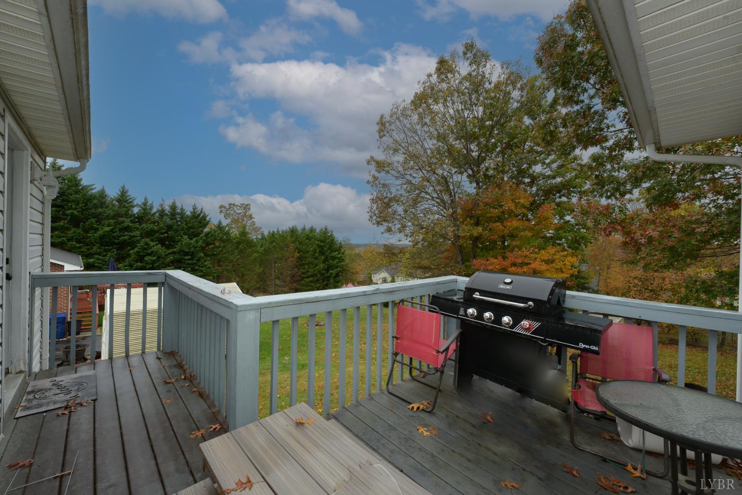 151 Wilderness Road Rustburg, VA 24588 - Photo 13 of 63 a view of deck with wooden floor and seating space