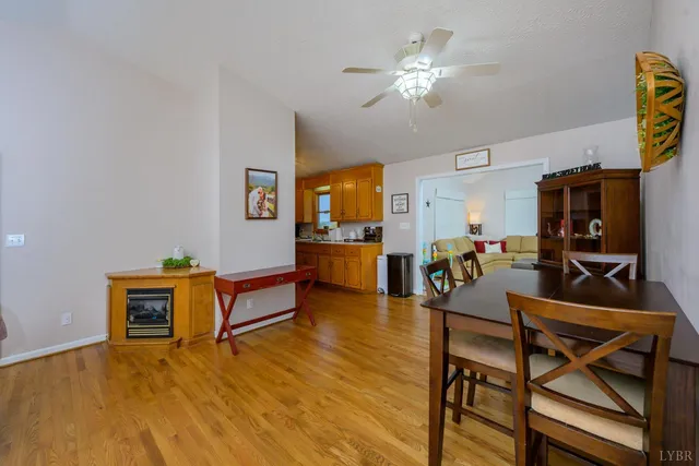 a kitchen with stainless steel appliances a refrigerator and a stove top oven