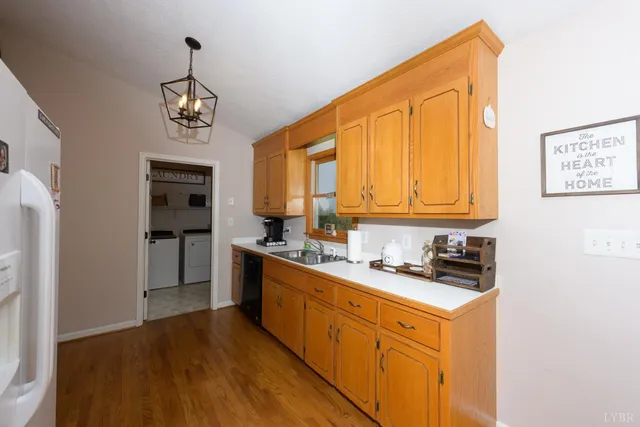 a kitchen with stainless steel appliances granite countertop a stove top oven
