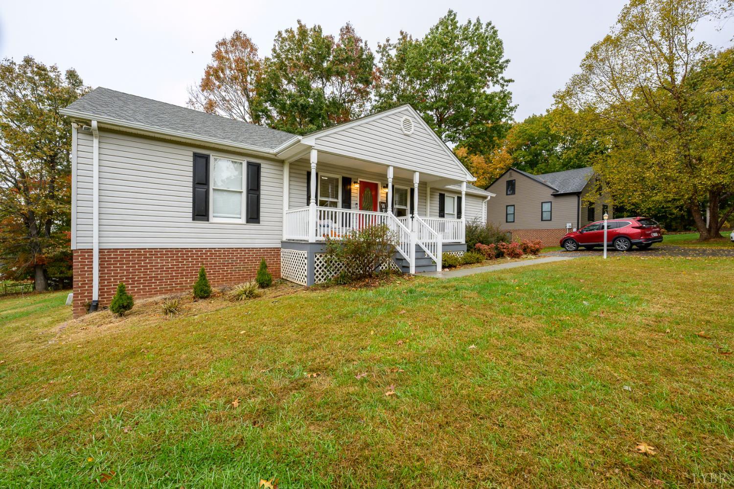 151 Wilderness Road Rustburg, VA 24588 - Photo 61 of 63 a front view of a house with garden