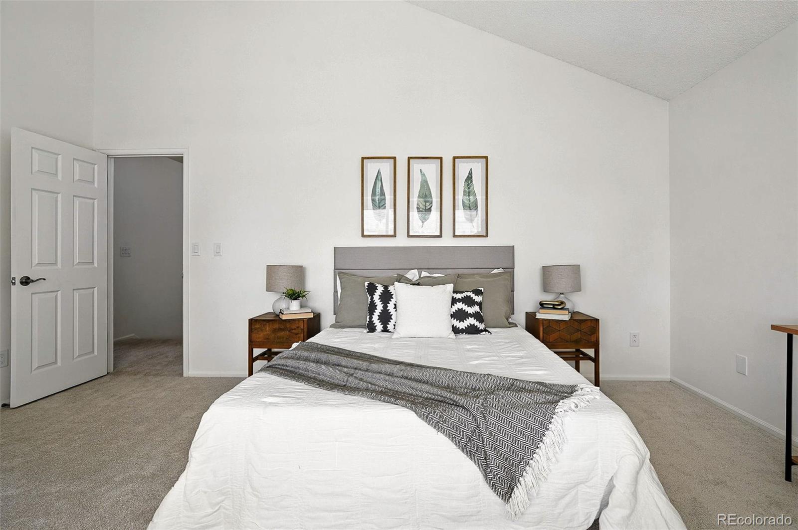 9400 East Iliff Avenue, Unit 321 Denver, CO 80231 - Photo 22 of 44 a bedroom with a bed and a window