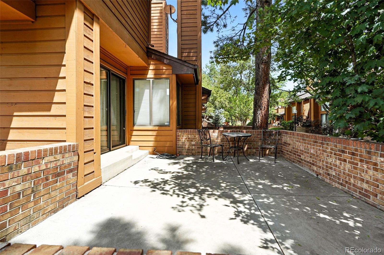 9400 East Iliff Avenue, Unit 321 Denver, CO 80231 - Photo 34 of 44 a view of a outdoor space with a patio