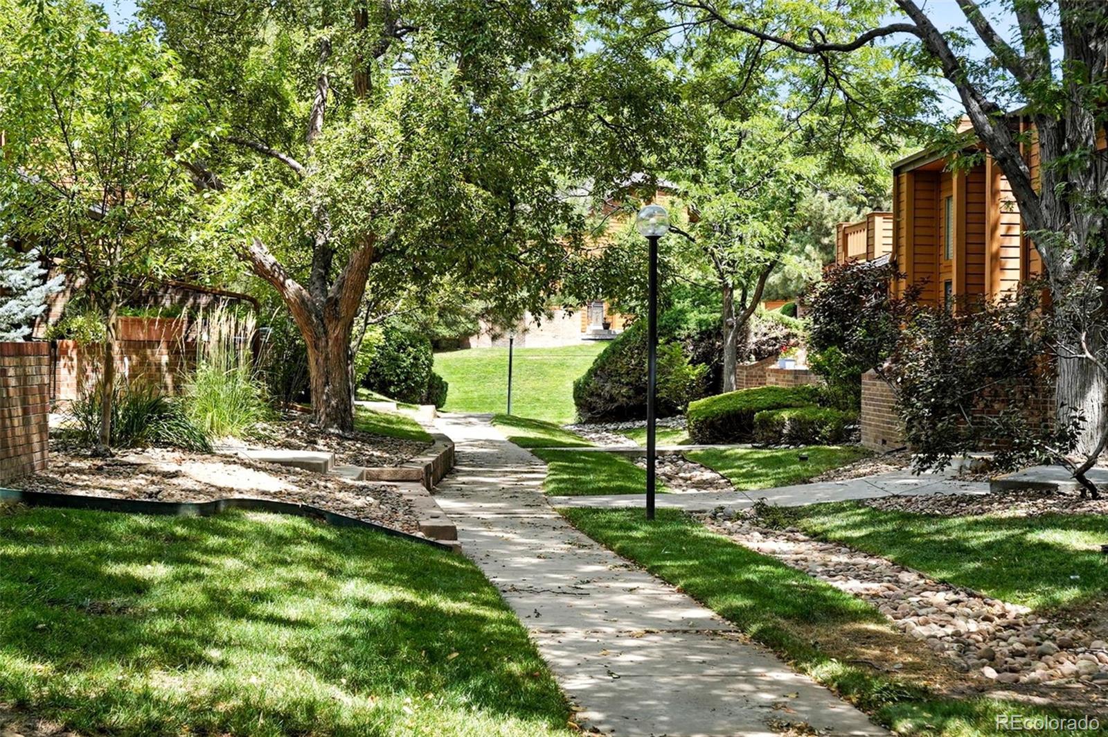 9400 East Iliff Avenue, Unit 321 Denver, CO 80231 - Photo 36 of 44 a view of a park with large trees