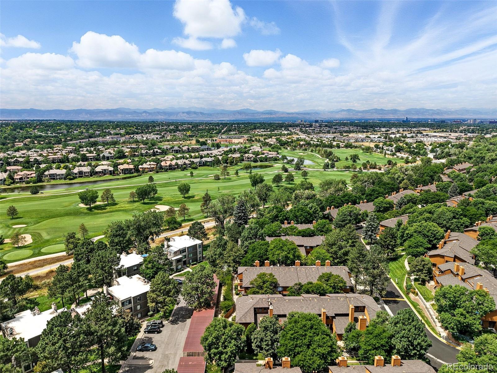 9400 East Iliff Avenue, Unit 321 Denver, CO 80231 - Photo 40 of 44 an aerial view of a houses with a yard