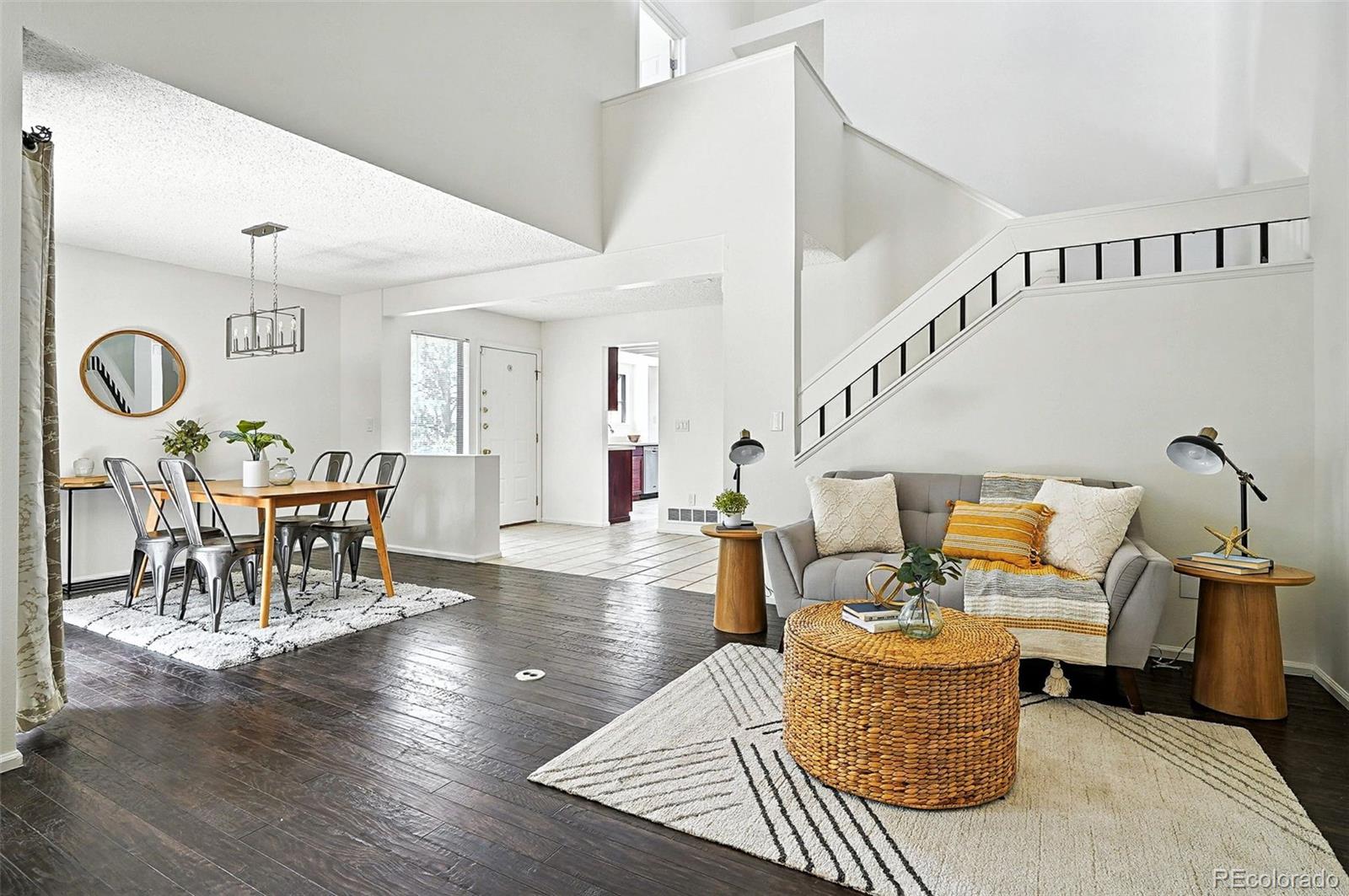 9400 East Iliff Avenue, Unit 321 Denver, CO 80231 - Photo 6 of 44 a living room with furniture and wooden floor