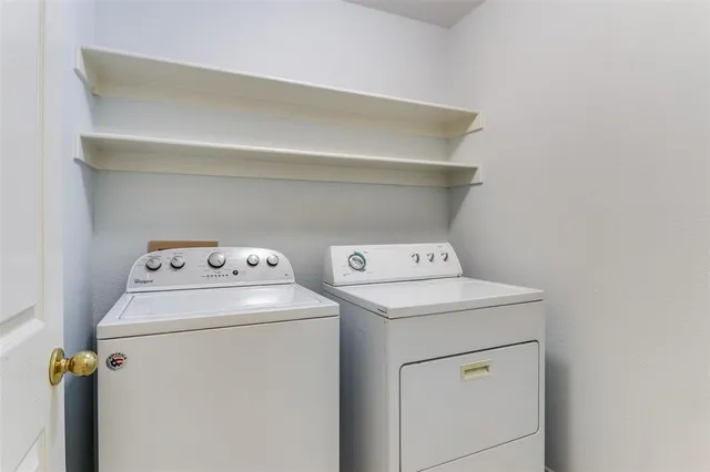 a bathroom with a shower and a bath tub