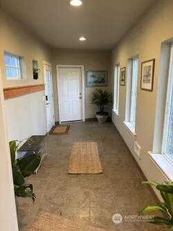 a view of livingroom with furniture and windows