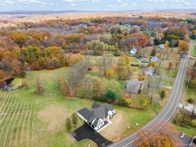 a view of a houses with a yard