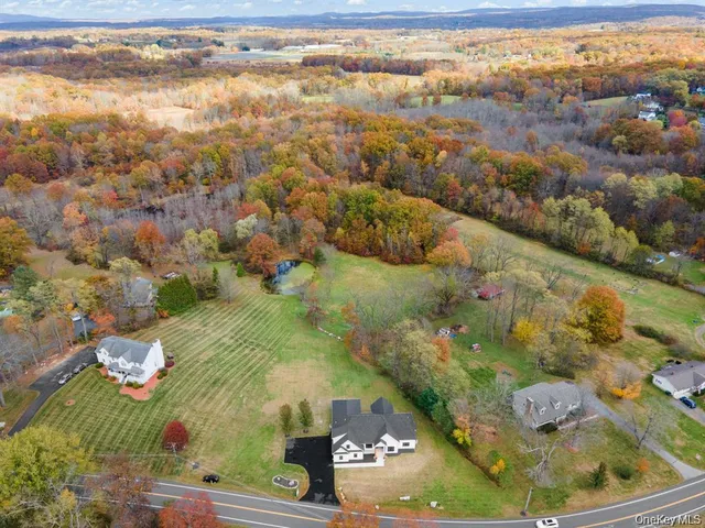 a view of a city with mountains in the background