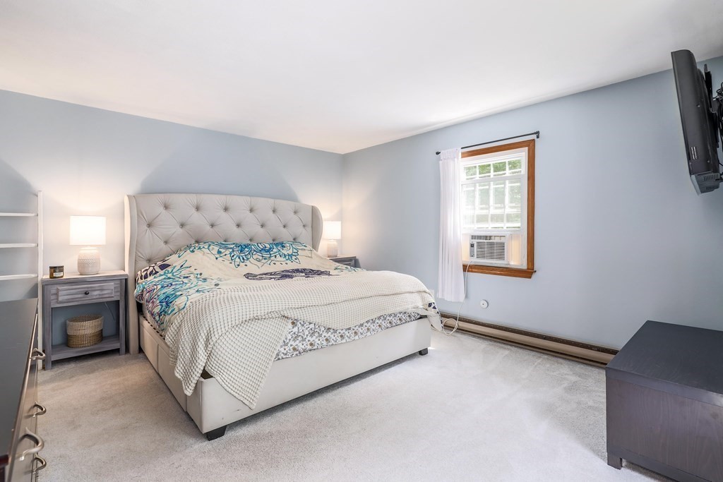 200 West Sutton Road Sutton, MA 01590 - Photo 20 of 33 a bedroom with a bed and a window