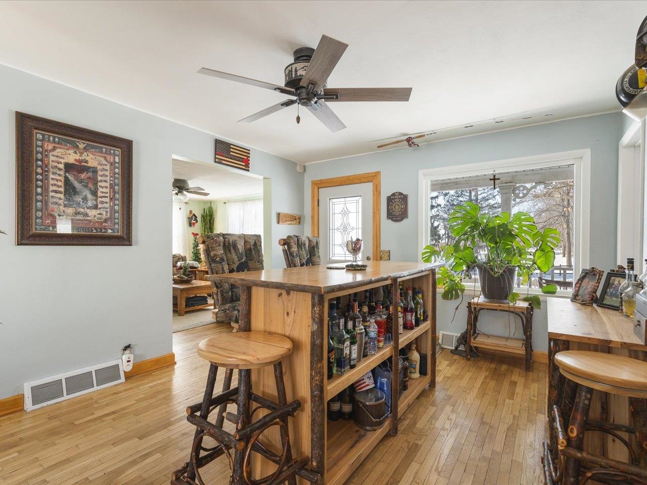 13005 Mitchell Street Shirland, IL 61079 - Photo 11 of 37 a living room with furniture and a wooden floor