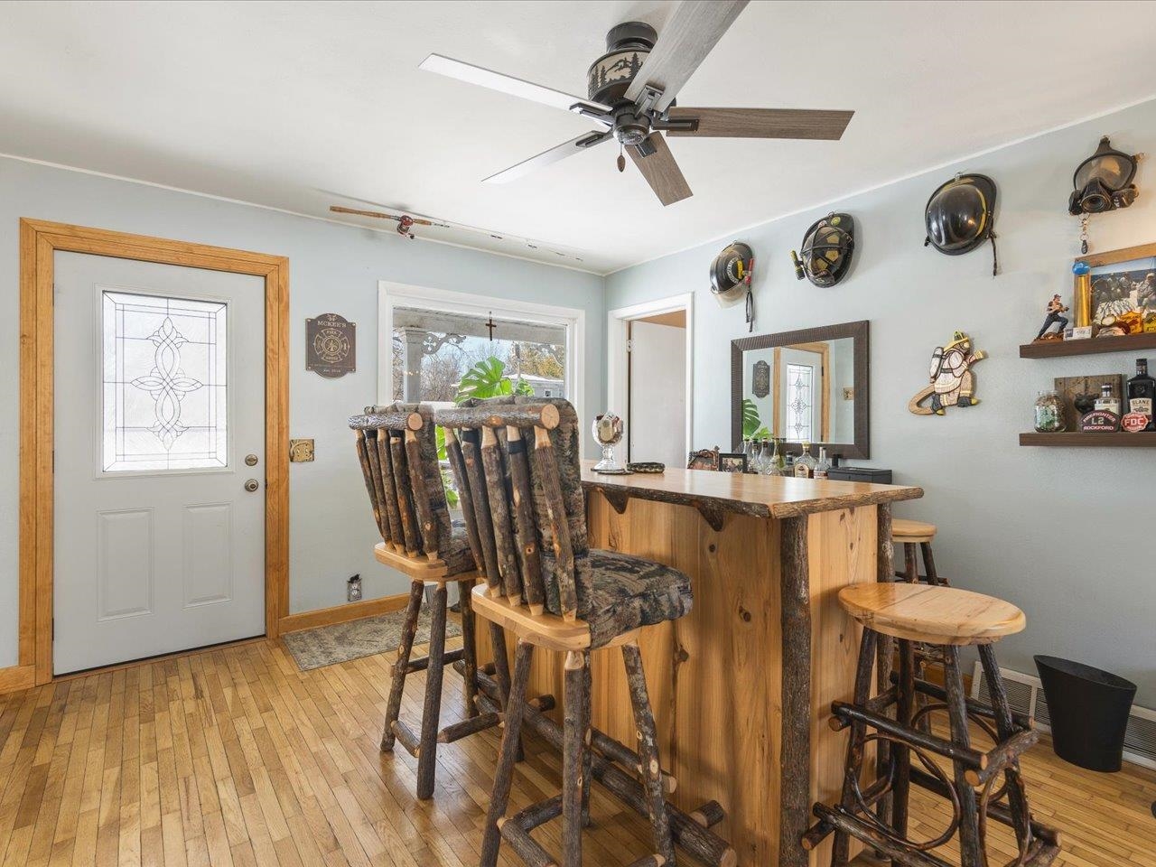 13005 Mitchell Street Shirland, IL 61079 - Photo 13 of 37 a view of a dining room with furniture and a chandelier