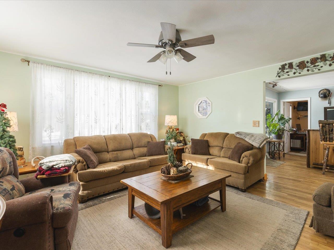 13005 Mitchell Street Shirland, IL 61079 - Photo 14 of 37 a living room with furniture and a large window
