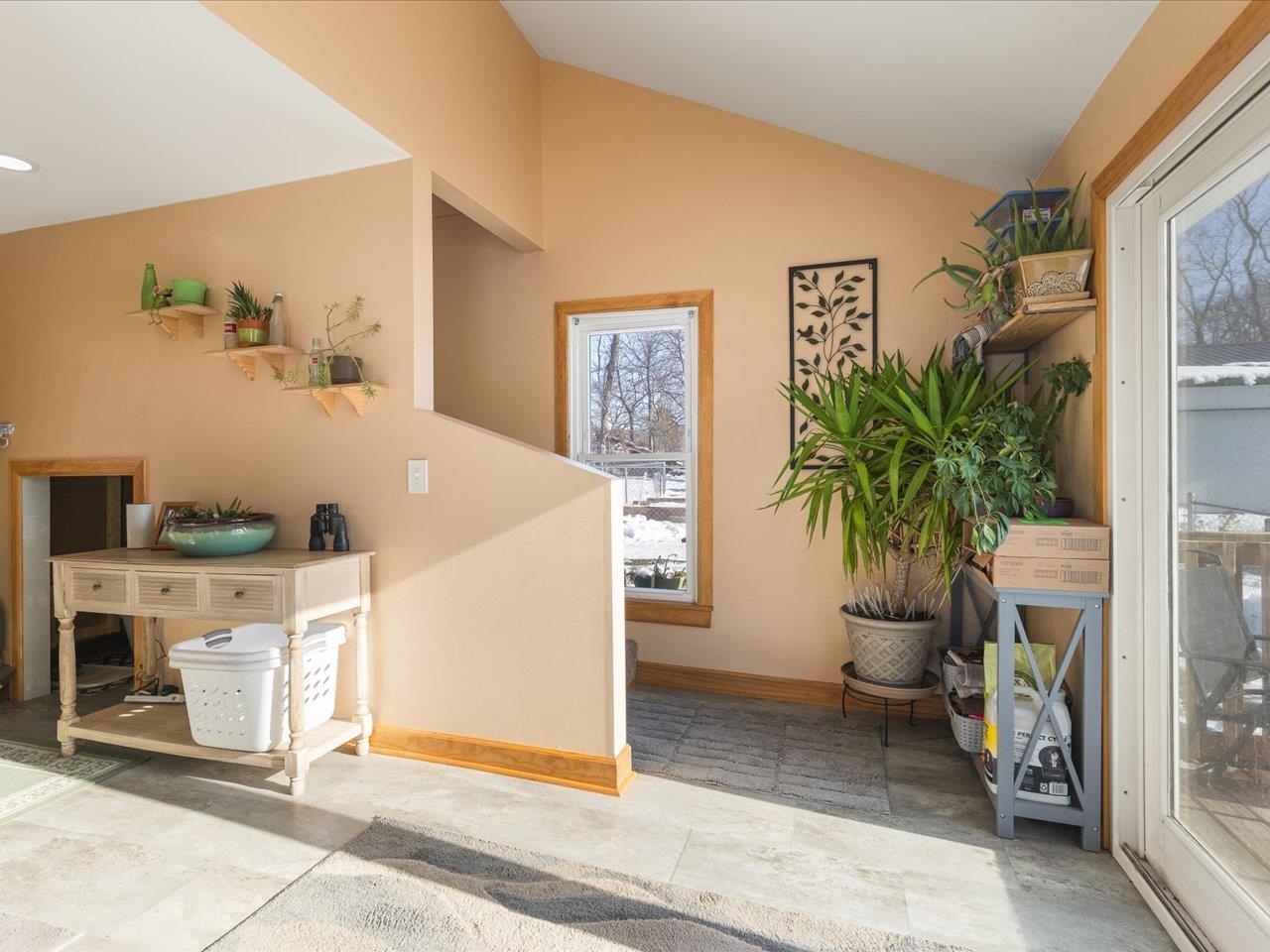 13005 Mitchell Street Shirland, IL 61079 - Photo 17 of 37 a living room with furniture and a potted plant