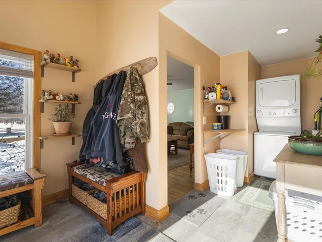 a bedroom with a bed a bookshelf and a bookshelf