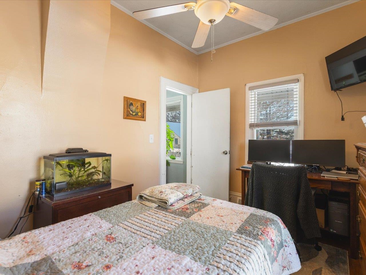 13005 Mitchell Street Shirland, IL 61079 - Photo 25 of 37 a bedroom with a bed and a flat screen tv