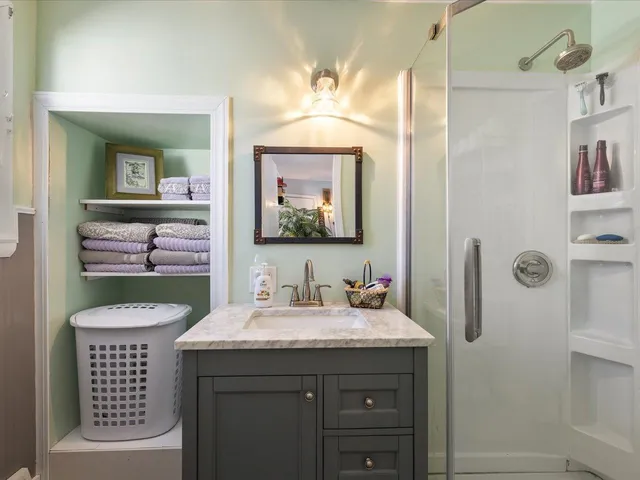 a view of a house with a snow and yard